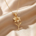 Gold Plated Silver Alstroemeria flower pendant necklace on champagne satin