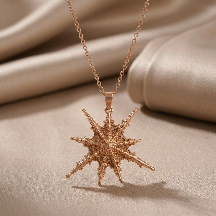 Rose Gold Plated Altair multi-point pendant necklace on soft satin