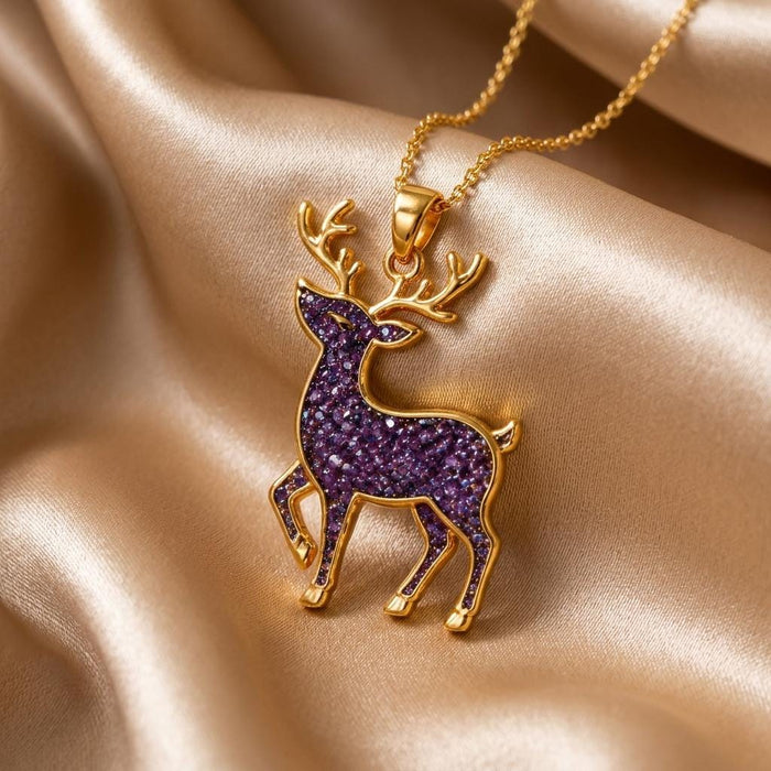 Gold Plated Silver Amethyst Druzy Deer Necklace with textured purple deer pendant on champagne satin