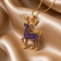 Gold Plated Silver Amethyst Druzy Deer Necklace with textured purple deer pendant on champagne satin