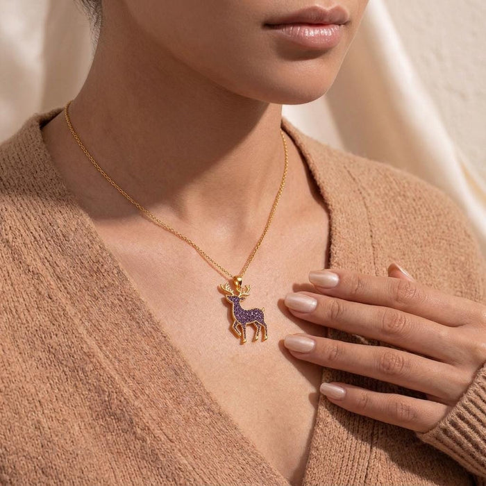 Gold Plated Silver Amethyst Druzy Deer Necklace worn with a textured beige cardigan