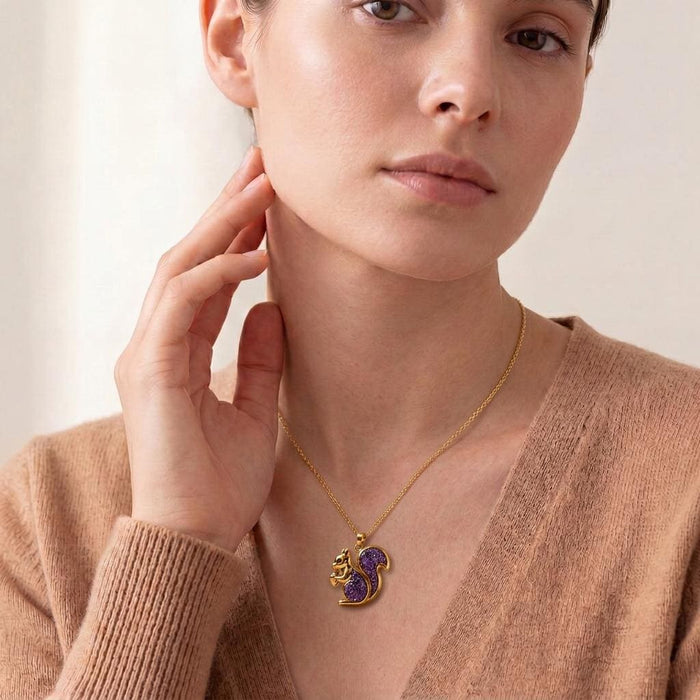 Model wearing a Gold Plated Silver Amethyst Druzy Snack Necklace with a purple squirrel pendant and curled tail