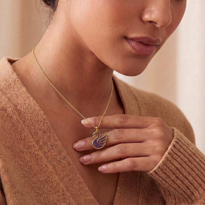 Amethyst Druzy Swan Pendant Necklace held near the collarbone on a Gold Plated Silver chain