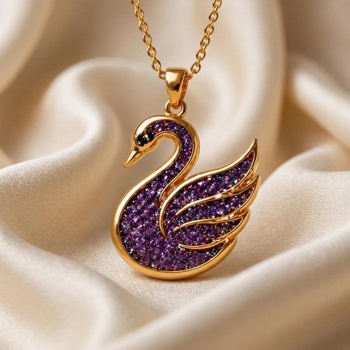Front view of the Amethyst Druzy Swan Pendant Necklace showing the curved neck, pointed beak, and divided wing