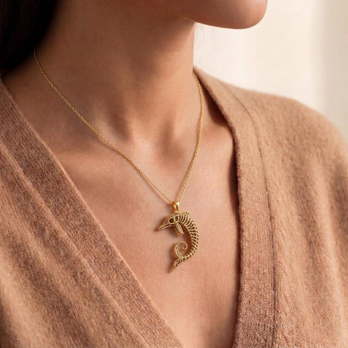 Gold Plated Silver Ancient Dolphin Fossil Necklace worn at the neckline