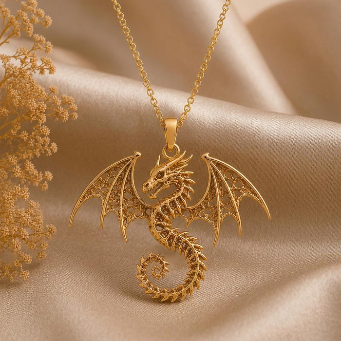 Gold-toned Ancient Dragon Fossil necklace on champagne satin with dried flowers
