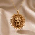 Gold Plated Silver Ancient Lion Skull Crest Necklace with a textured radiating mane on beige fabric
