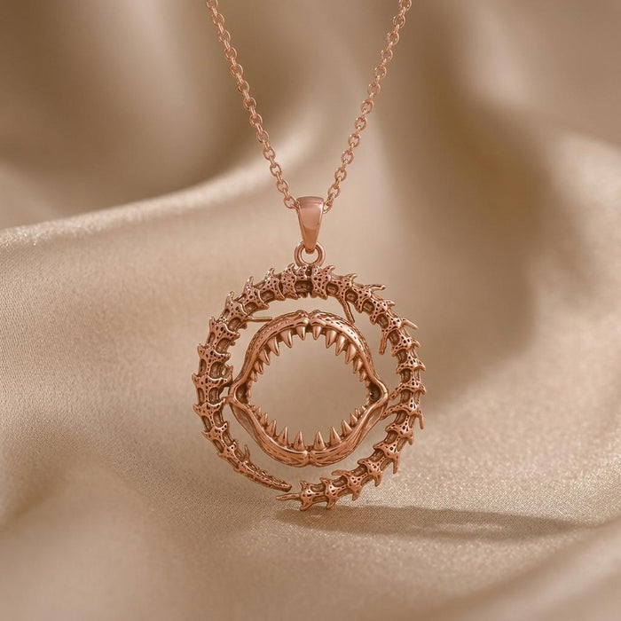 Rose Gold Plated Ancient Shark Jaw Pendant Necklace on softly folded champagne satin