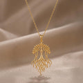 Gold Plated Silver Banyan Flow Necklace with an openwork branching tree and flowing roots on champagne satin