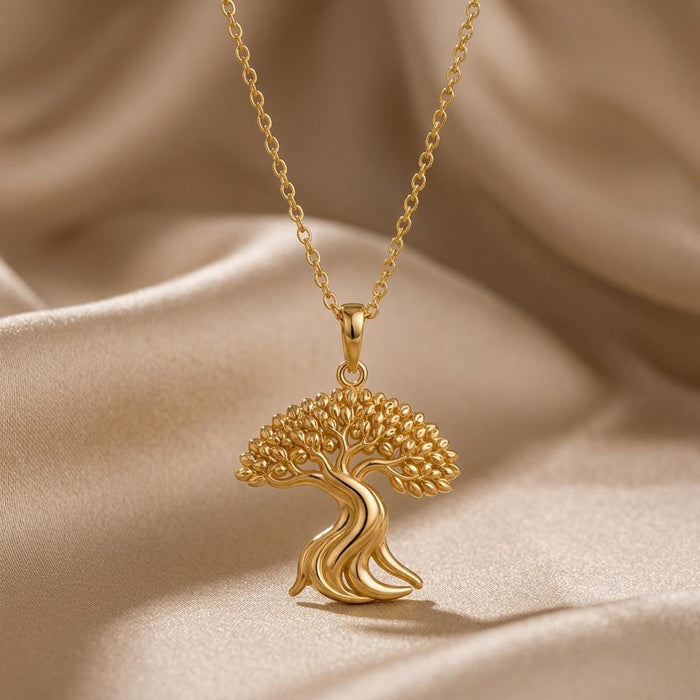 Gold Plated Silver Ficus Flow Pendant with a rounded bead-like tree canopy on champagne satin