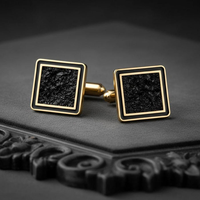 Gold Plated Silver Black Onyx Cufflinks with textured square panels and double-frame borders on a dark display surface