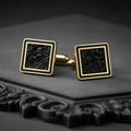 Gold Plated Silver Black Onyx Cufflinks with textured square panels and double-frame borders on a dark display surface