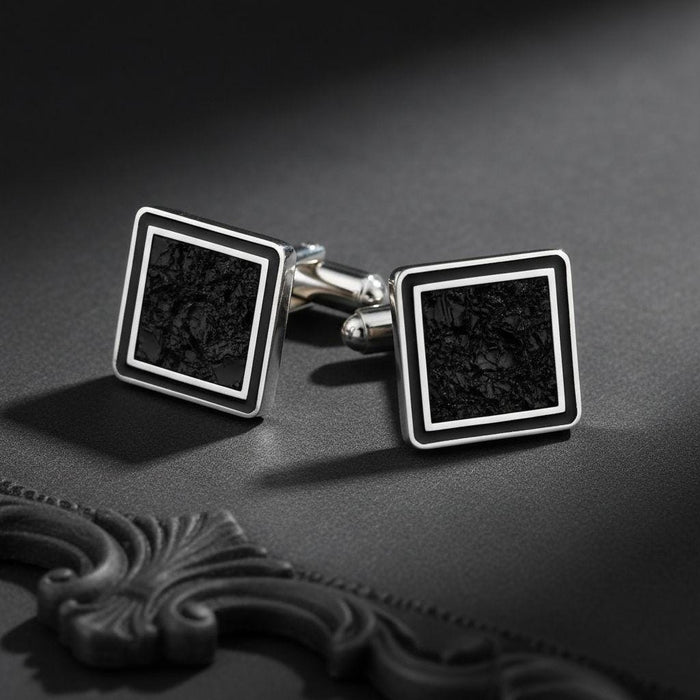 Silver Black Onyx Cufflinks with textured square center panels and visible posts on a charcoal surface