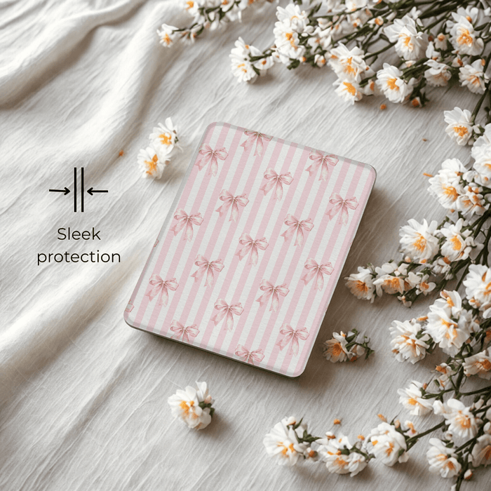 Angled view of blush bows Kindle case showing slim profile