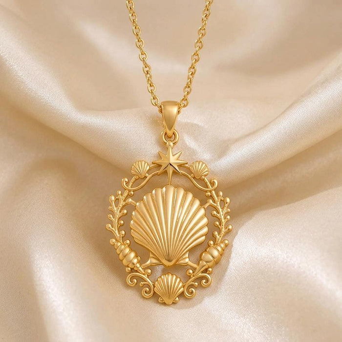Close-up of a Gold Plated Silver Shell Halo Pendant Necklace showing the star, shell accents, and curled frame