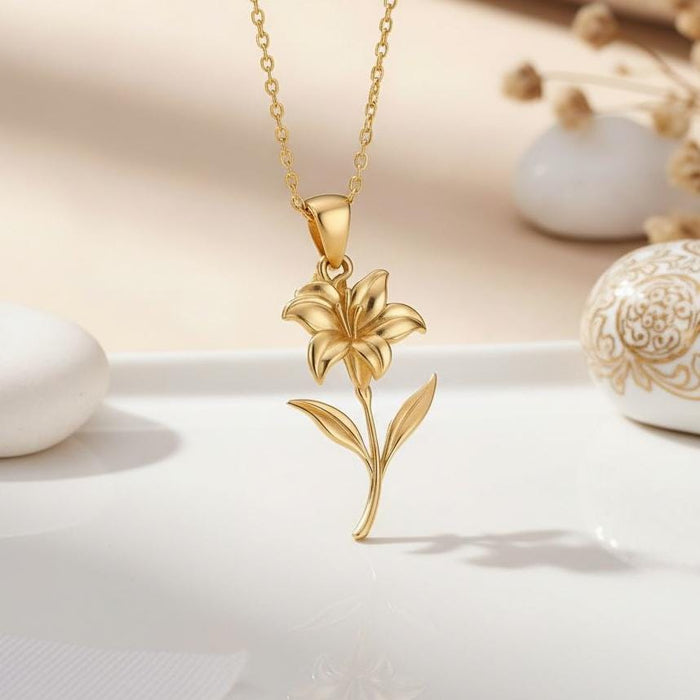 Close-up Gold Plated Silver Canna Flower Pendant Necklace with a sculpted bloom, curved stem, and two leaves