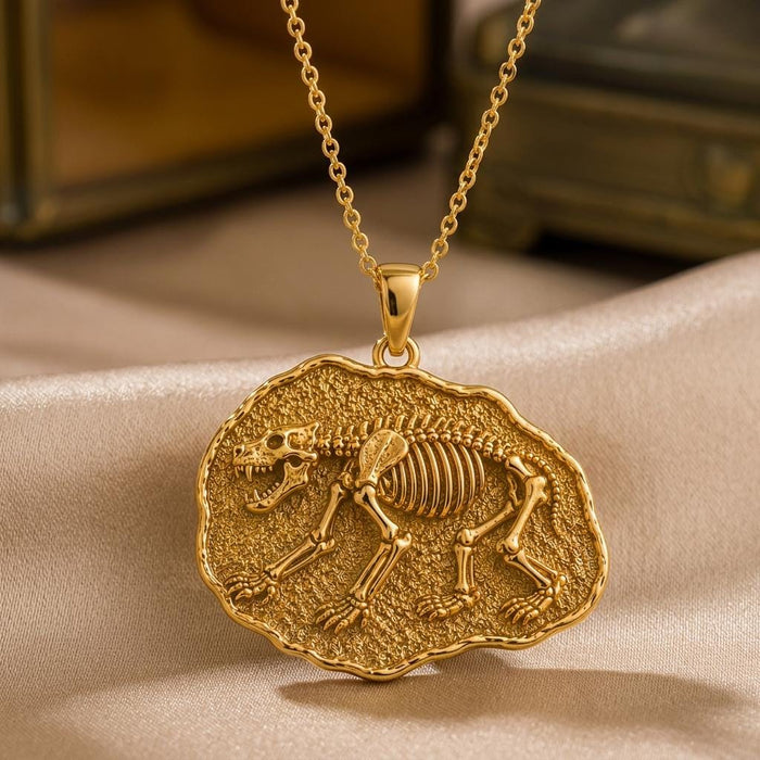Gold Plated Silver Cave Bear skeleton relief on an irregular textured medallion