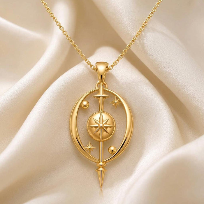 Gold Plated Silver Celestial Barrier Pendant Necklace with compass-star centerpiece on ivory satin