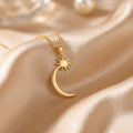 Gold Plated Silver Celestial Crescent Star Necklace with a radiant pointed star and smooth crescent on champagne satin