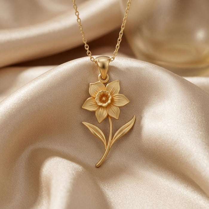Gold Plated Silver daffodil flower pendant necklace with engraved petals on champagne satin