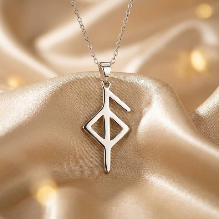 Silver Health Rune pendant necklace displayed on champagne satin
