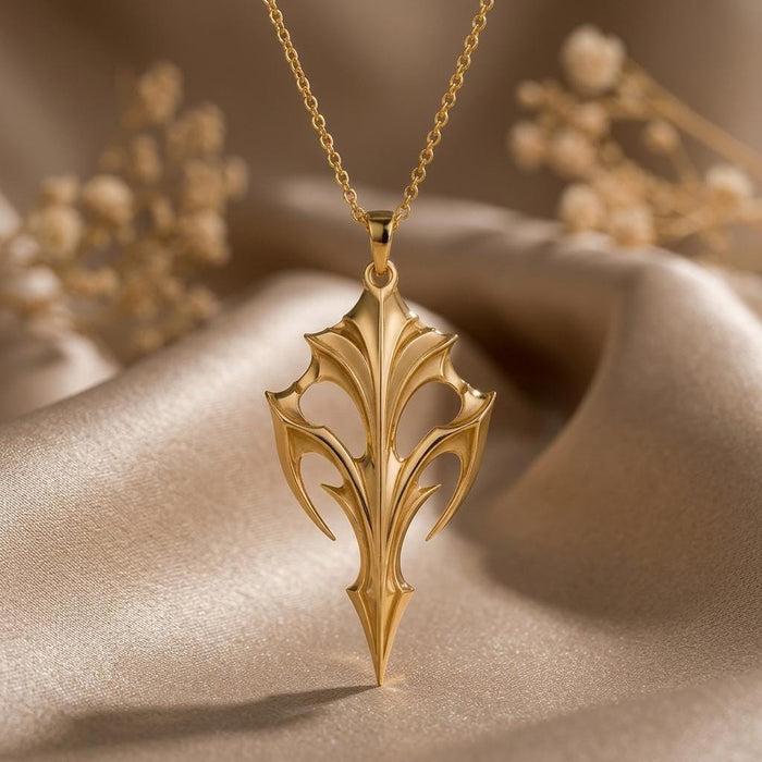 Gold Plated Silver Eclipse Armor Pendant with layered openwork lines on beige satin