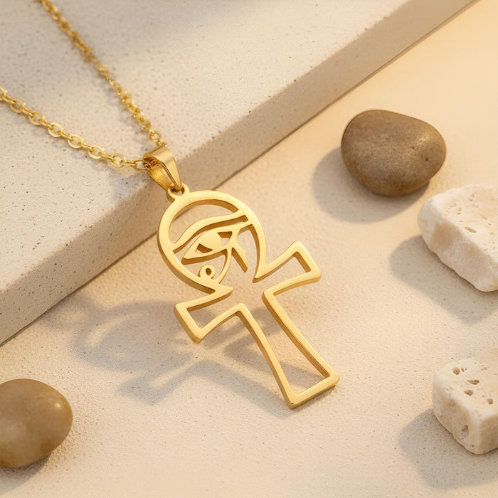 Close-up of a Gold Plated Silver Egyptian Ankh Cross pendant with circular openwork eye detail