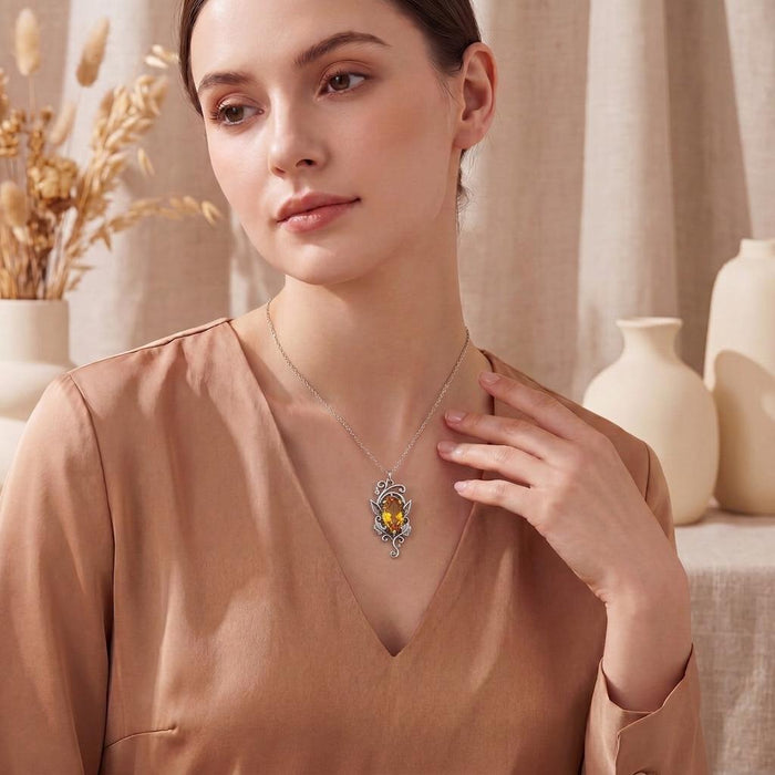 Model wearing an Elven Birthstone Necklace with a vertical marquise-shaped stone pendant