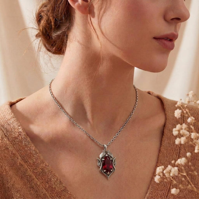 Side view of a model wearing a Silver Elven Birthstone Necklace with a marquise-shaped pendant