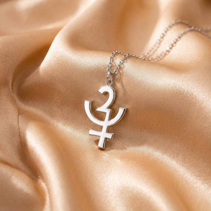 Silver Erinyes symbol pendant necklace arranged on champagne satin