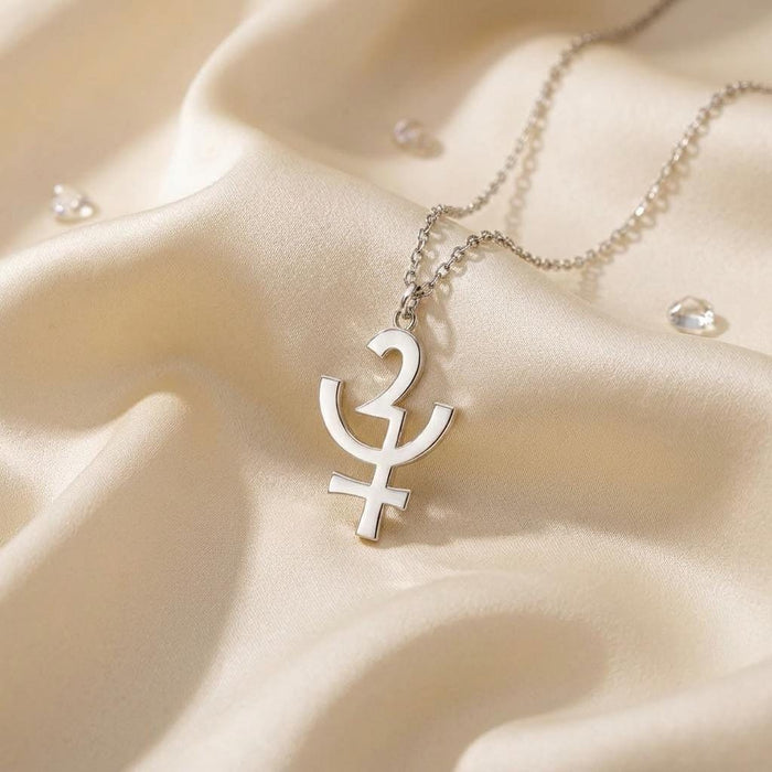 Silver Erinyes symbol pendant necklace on ivory satin with clear decorative stones in the background