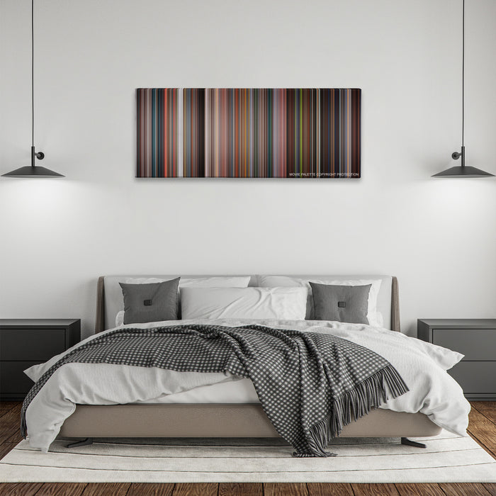 Fantastic Four color palette canvas above a bed, between two black pendant lamps