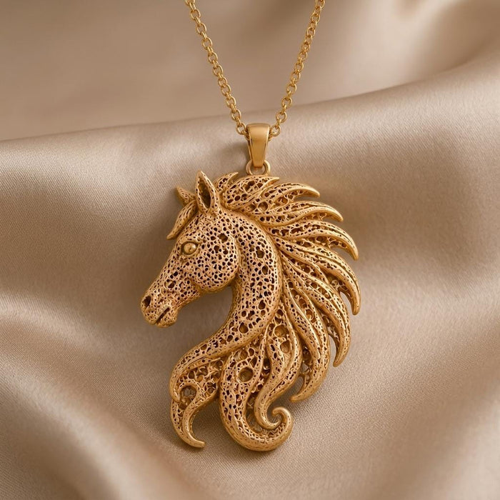 Gold Plated Silver Fossil Horse Crest Necklace with an openwork horse-head pendant on champagne satin