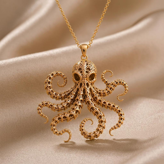 Gold Plated Silver Fossil Octopus Spine Pendant Necklace with curled openwork tentacles on champagne satin