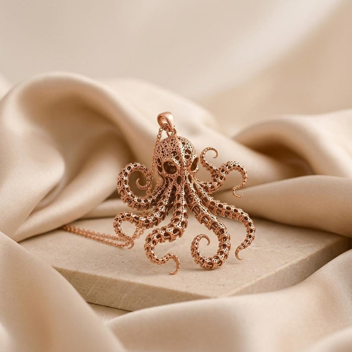 Rose Gold Plated Fossil Octopus Spine Pendant Necklace standing on a pale stone platform