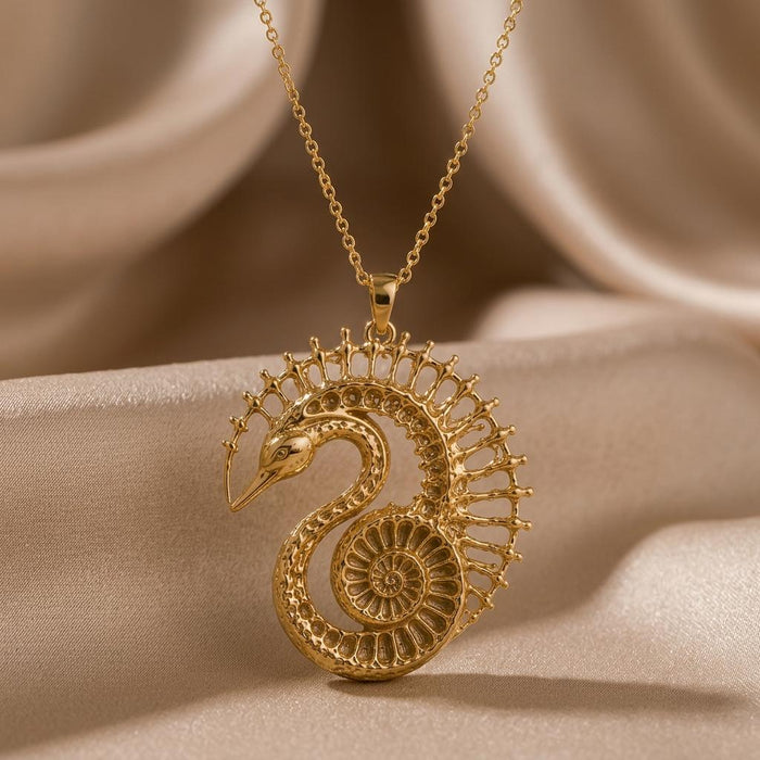 Close-up of the Gold Plated Silver Fossil Swan Halo Pendant Necklace showing the swan and spiral center