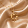 Gold Plated Silver Solar Eclipse Necklace with an open circular center and pointed rays on champagne satin