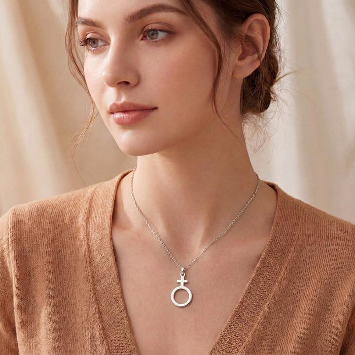 Silver Antimony Necklace worn at the collarbone with a V-neck knit top