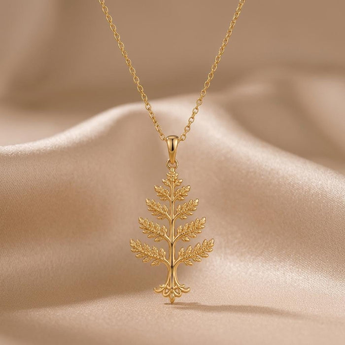 Gold Plated Silver Cedar Crest Necklace with tiered branch pendant on champagne satin
