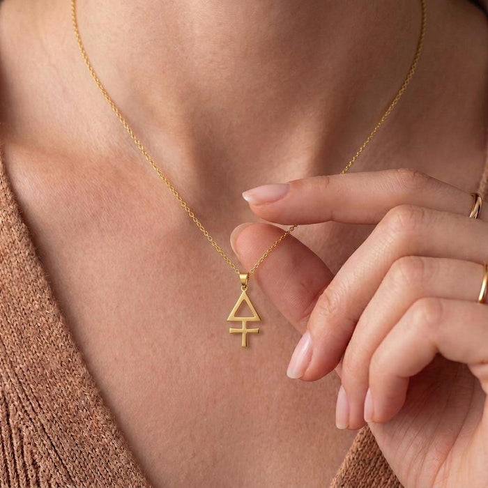Close view of a Gold Plated Silver Esoteric Sulfur Necklace with an open triangular pendant worn at the neckline