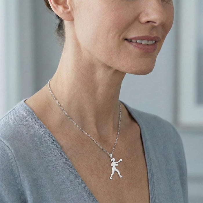 Female Boxer Necklace worn with a gray V-neck top