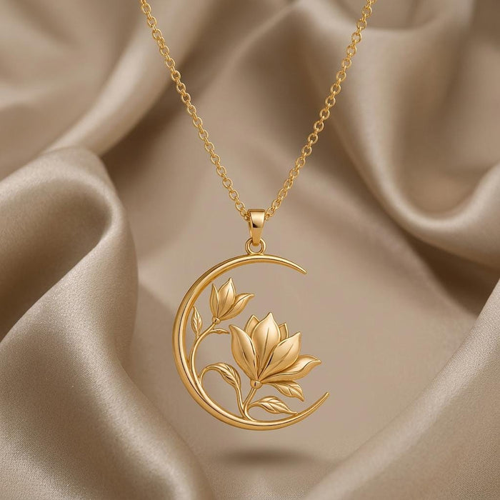 Front view of the Gold Plated Silver Lunar Magnolia Pendant with magnolia flowers, curved stems, and open crescent frame