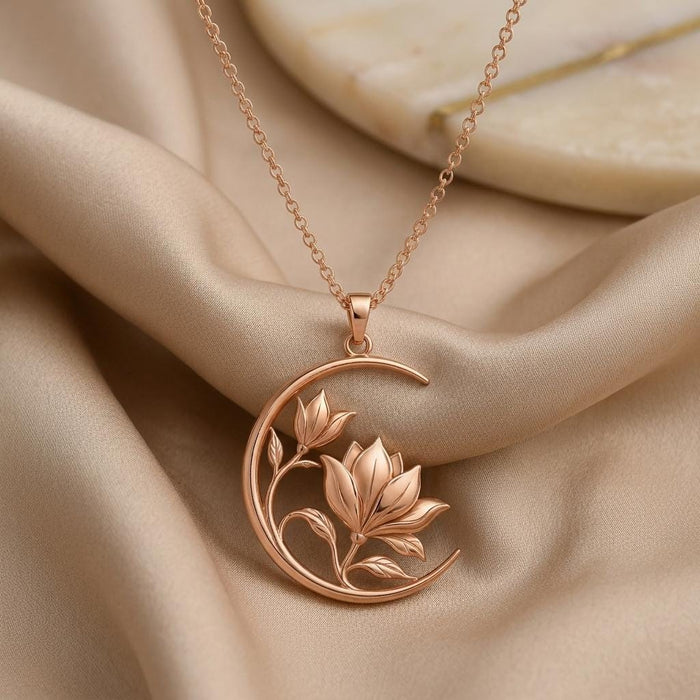 Rose Gold Plated Lunar Magnolia Pendant with layered magnolia flowers on champagne satin