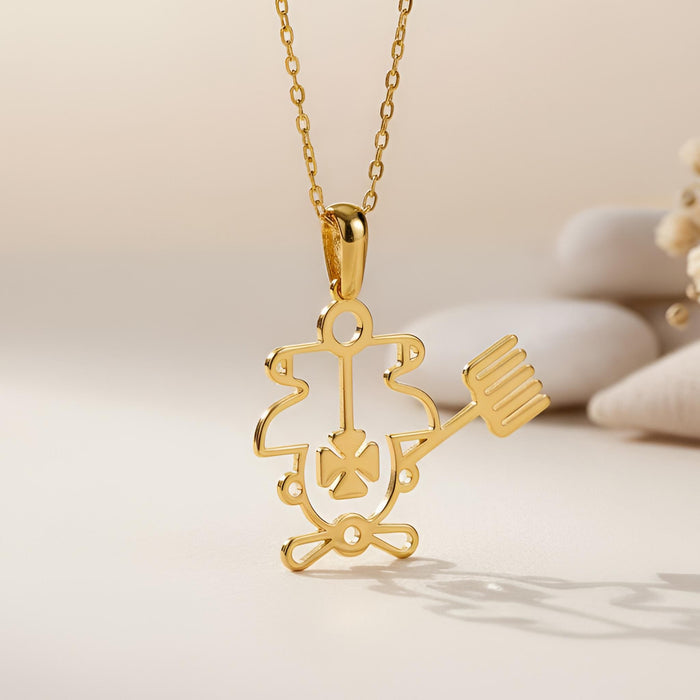 Close-up of the Gold Plated Silver openwork Purson seal pendant hanging from its chain