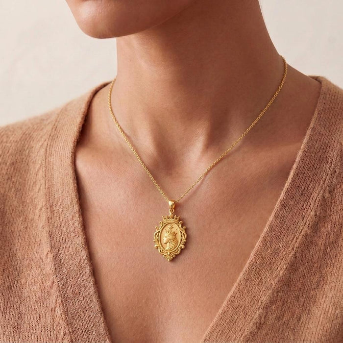 Close neckline view of a Gold Plated Silver Queen Aura Pendant necklace