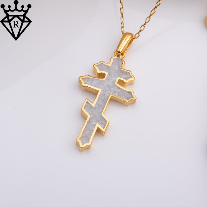 Angled close-up of the Gold Plated Silver rainbow moonstone stepped cross pendant