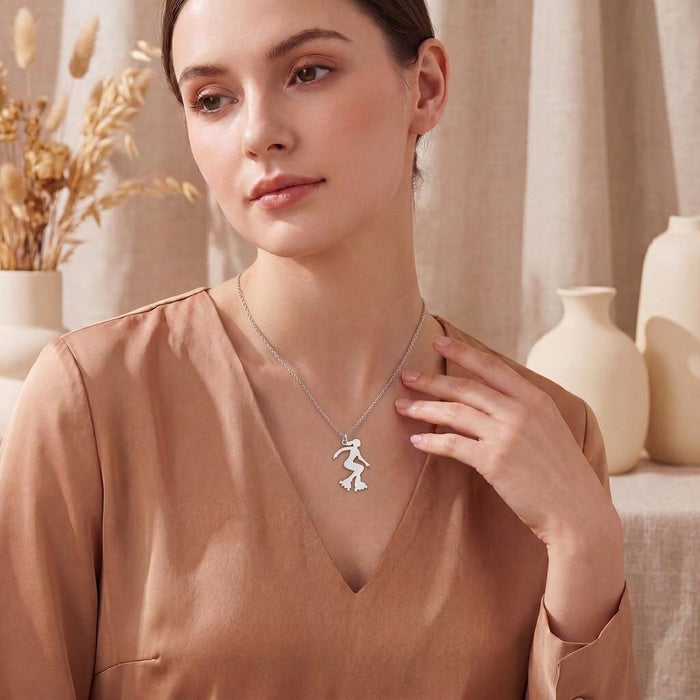 Roller Skater Necklace worn with a neutral V-neck top