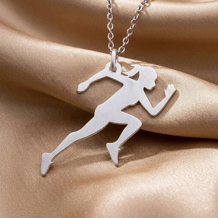 Close-up of the solid running woman pendant with flowing ponytail detail on champagne satin