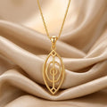 Gold Plated Silver Spirit Gate Pendant necklace on champagne satin