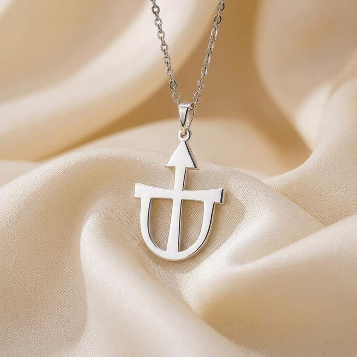 Close view of Teutonia symbol pendant with pointed upper form and rounded openwork base